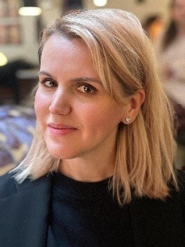 Porträttbild av Besa Hajzeri